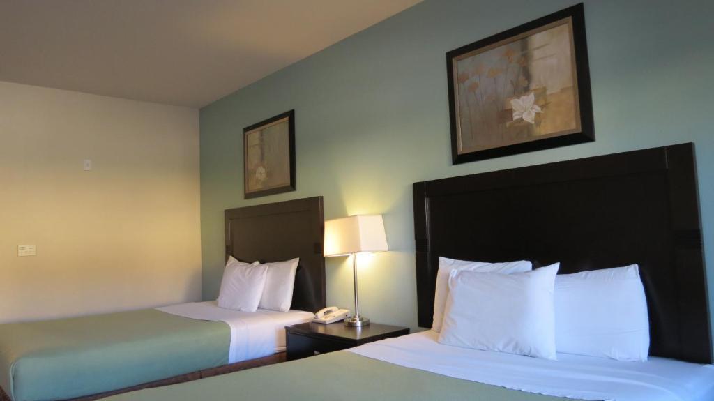 Grand Inn And Suites Houston Quarto foto